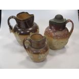Early 19th century stoneware jug with a plated cover; two Doulton stoneware jugs sprigged with