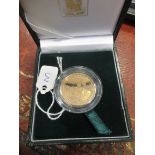 A Hong Kong Millenium gold proof medal celebrating the Year of the Dragon, cased by the Royal