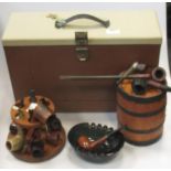 A collection of pipes, an ashtray, circular pipe stand, a medallian cuban cigar box, a small