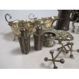 Two silver sauce boats, four napkin rings, a small tankard, a pin tray, a toast rack, a pair of