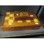 Rosewood and boxwood chequer inlaid folding mahogany games box with playing pieces' and 'Reversi'