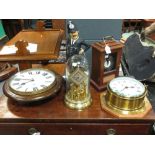 Two round dial wall clocks, an anniversary clock, a musical box and a model of a policeman (5)