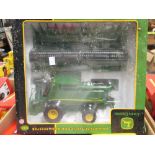 Britains model farm vehicles in boxes, 1:32 scale, including tractors and and an Ertl Combine