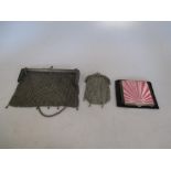 Two silver chain mail purses and an Art Deco enamelled powder compact