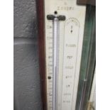 Negretti and Zambra oak stick barometer, late 19th century, with exposed tube