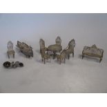 A Filligree silver miniature suite of seat furniture and two brooches