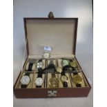 A cased collection of 12 watches including a 9ct gold 'Marvin' wristwatch on a strap, and a '