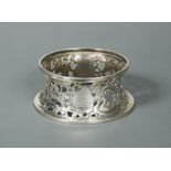 A Victorian silver dish ring, by John and Frank Pairpoint, London 1900, of pierced and concave form,