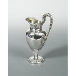 A William IV silver wine ewer, possibly by Thomas Wallis, London 1832, of heavy gauge and baluster