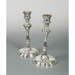 A pair of Victorian silver plated candlesticks, by Elkington & Co,1865, the circular lobed base