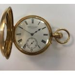 Ortner & Houle - A Victorian 18ct gold half hunter pocket watch, circa 1870, the front lid with blue