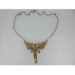 A gold pendant necklace with fully modelled figure of Icarus in his glory, the naked body of the