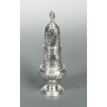 A George III silver sugar caster, by John Delmester, London 1764, of baluster form with repoussé