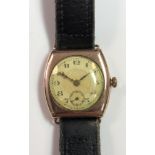 Rolex - A 9ct gold gentleman's wristwatch, circa 1923, the unsigned circular two tone cream coloured