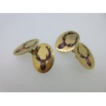 A pair of stag's head 18ct gold and enamel cufflinks, of oval form each of the four plaques