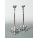 A pair of Victorian silver plated cast column candlesticks, by Elkington & Co,1869, the base of