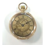 An unsigned continental 14ct gold open faced pocket watch, the gilt floral dial, 30mm diameter