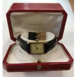 Cartier - A vermeil 'Les must de Cartier' 'Tank' wristwatch, circa 1980, the signed and plain