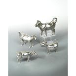 A 19th century Dutch silver naturalistic cow creamer, Dutch export marks and rampant lion mark