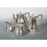An American metalwares four piece tea and coffee set, the teapot of circular form with tapering