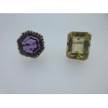 An amethyst dress ring and a similar citrine ring, the hexagonal cut amethyst, measuring 17.5mm