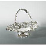 A Victorian silver plated swing handled bread basket, by Elkington & Co, 1871, of oval dished and
