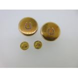 A small collection of 19th century French 18ct gold gentleman's requisites, comprising a pair of