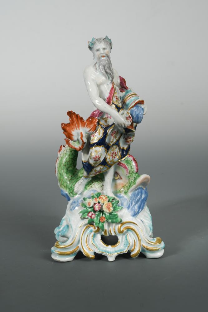 An 18th century Bow figure of Neptune, circa 1755-60, standing holding a jar issuing water with a
