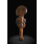 A 19th century Maori wood Wahaika handclub, of classic rounded shape with side notch, finely