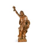A late 18th or early 19th century carved wood figure emblematic of Autumn, the male figure holding
