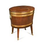 A late 18th century brass bound mahogany wine cooler, with lead lined interior, on a period stand 67