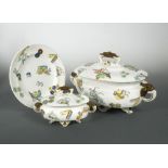 A Royal Worcester Aesthetic Movement part dinner service, the tureens with elephant mask handles and