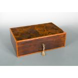 A Dunhill walnut humidor, the hinged cover opening to reveal a partitioned interior with