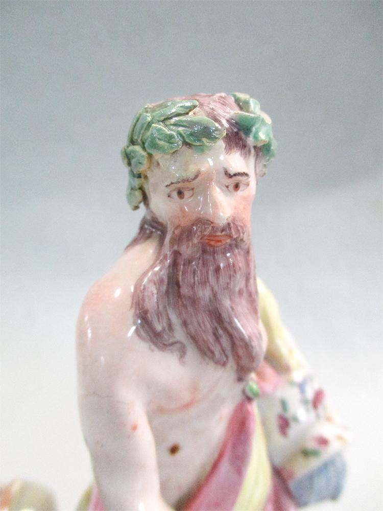 A Bow figure of Neptune, circa 1755, modelled standing holding a jar issuing water with a dolphin by - Image 2 of 8