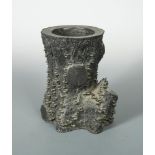 A Japanese bronze naturalistic water vessel, Meiji Period (1869-1912), cast as a lower tree trunk