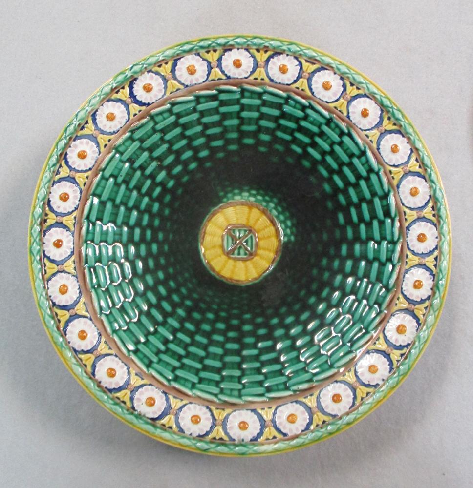 A Wedgwood Majolica dessert service, the 'basketweave' centres within stylised daisy head borders, - Image 2 of 5