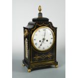 Barwise, London, a Regency ebonised and brass inlaid bracket clock, the shaped top case with acorn