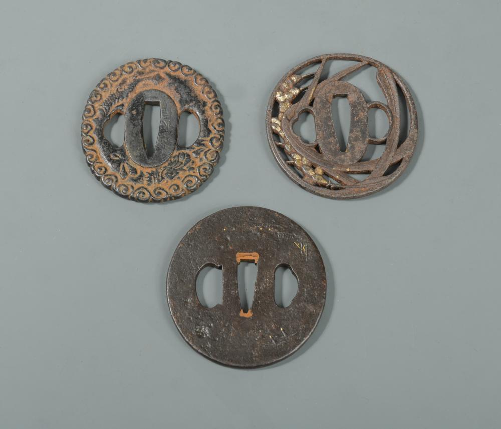 Two Japanese Tsubas, Edo period, both parcel gilt, one circular pierced as millet and another with