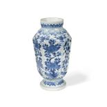 A Chinese blue and white hexagonal vase, Kangxi (1662-1722), decorated with panels of