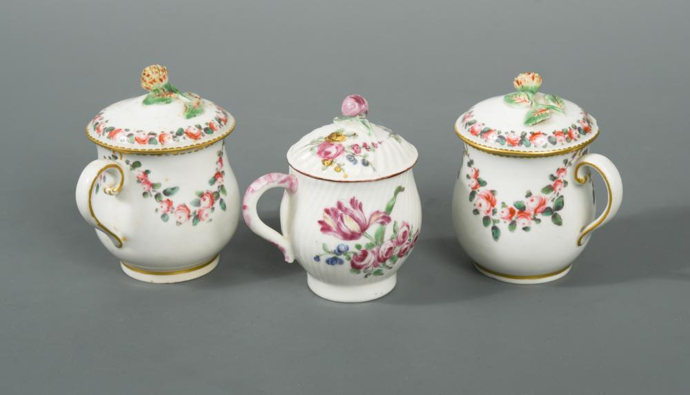 A Mennecy custard cup and cover, circa 1760, of spirally fluted form decorated with scattered floral