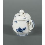 A Tournai blue and white baluster custard cup and cover, circa 1780, decorated with floral sprays