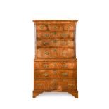 A George I walnut chest on chest, feather banded border decoration, the upper half with three