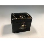 A 19th century papier maché tea caddy by Jennens & Bettridge, of canted rectangular form inlaid with