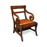 A modern Regency style metamorphic mahogany library armchair, in the manner of Morgan & Sanders,