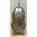 A late Victorian brass lantern clock, in 17th century style, the traditional design case signed '