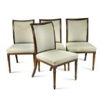 A set of four early 19th century brass mounted mahogany side chairs, in the manner of Gillows of