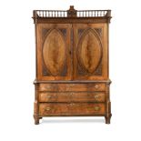 A late 19th century Dutch Neo-Classical mahogany armoire, circa 1800, the gallery top above a pair