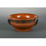 A 19th century Wedgwood Rosso Antico two-handled pedestal bowl, sprigged with a border of palmettes,