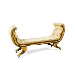 A Regency faux rosewood and parcel gilt framed window seat, with incurved ends and buttoned fabric