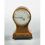 A Regency mahogany and cross-banded balloon mantel timepiece, the circular 4.5inch (11.5cm) silvered